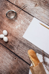 Fresh bread on a wooden surface