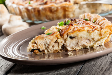 Slice of tart with chicken amd mushrooms