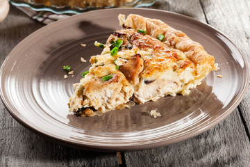 Slice of tart with chicken amd mushrooms
