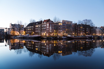 Fototapeta na wymiar Oudeschans Canal and buildings in Amsterdam