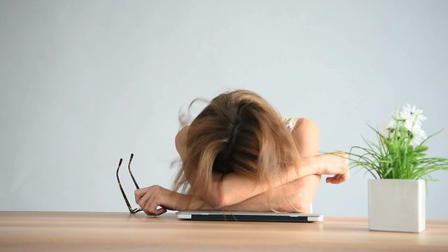 Businesswoman being upset in front of latpop