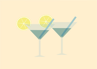 The Martini glass / two glasses of Martini with a slice of lime