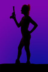 silhouette of a woman in heels and a dress with gun stand side