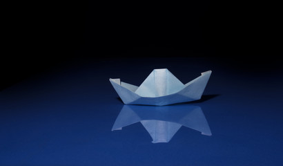 blue paper boat