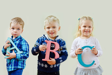 toddlers  with letters abc