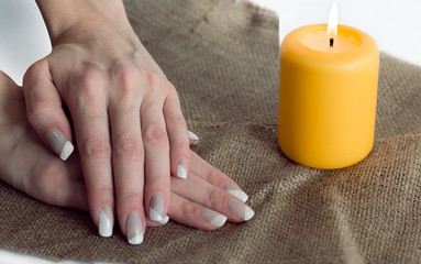 Obraz na płótnie Canvas grey with white nail asymmetry art manicure