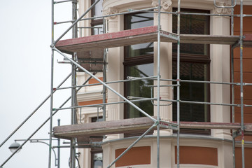 old building with scaffolding undergoing repair