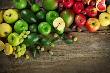 Fruits on wooden background