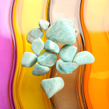 Semiprecious stones on bright background