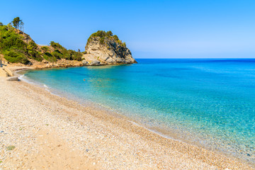 Fototapeta na wymiar A view of Karlovasi beach with azure sea water, Samos island, Greece