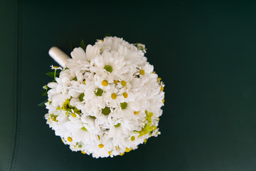 Beautiful wedding bouquet with chamomile