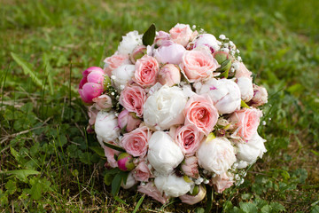 Beautiful wedding bouquet on grass