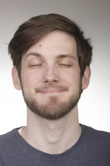 Obraz premium Closed eyes, not looking, portrait young man..