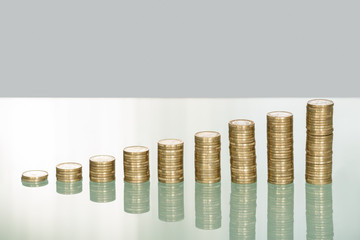 Golden Coin Stack On Desk