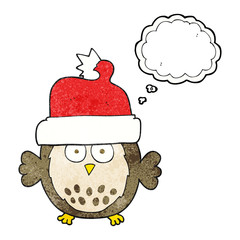 thought bubble textured cartoon owl wearing christmas hat