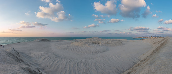 Panorama View of the desert meeting the ocean in Dubai