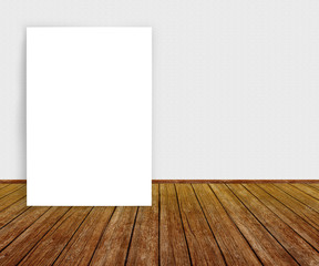 Blank white poster leaning on clean wall, mock up for product