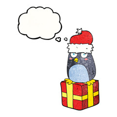 thought bubble textured cartoon christmas penguin