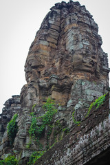statue Bayon Temple Angkor Thom, Cambodia. Ancient Khmer architecture.