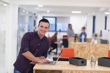 startup business, young  man portrait at modern office