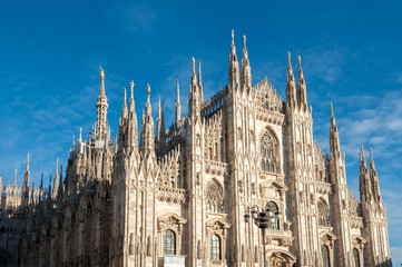 Fototapeta na wymiar Milan Cathedral under blue sky
