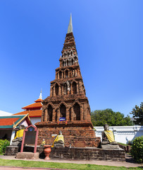 Fototapeta na wymiar Pagoda in Wat Phra That Hariphunchai at Lamphun north of Thailan