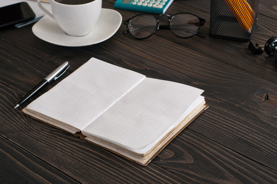 open notebook with pen closeup