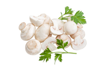 Several whole and several halfs of a button mushroom