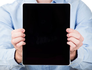 hands holding a tablet touch computer gadget with isolated scree