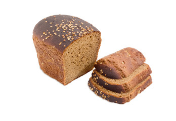 Brown bread with coriander seeds on a light background
