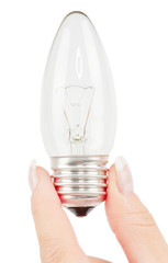 Lit lightbulb held in hand