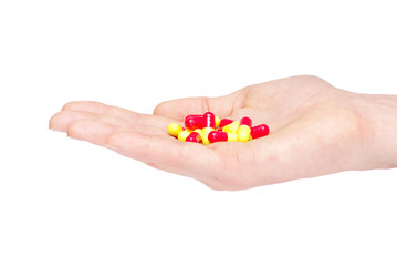 close up round white pill in hand