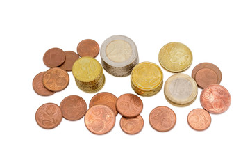 Different euro coins on a light background