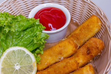Fried Mozzarella cheese sticks with tomato sauce