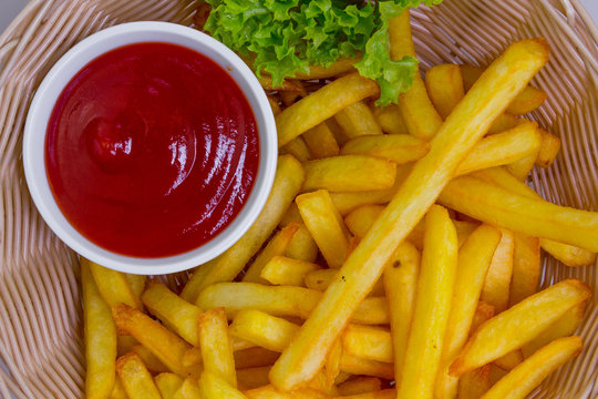 Fresh fried french fries with ketchup