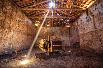 Fototapeta na wymiar Antique tools in old rural barn