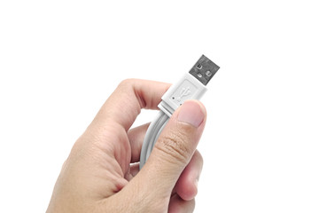 Isolated Woman hand holds a smart phone charger