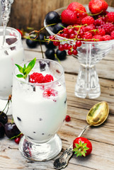 Ice cream with berries and mint