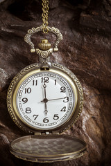 Fototapeta na wymiar Retro pocket watch ancient on wood. vintage style. close up