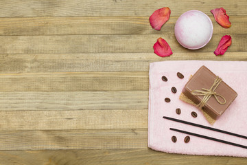 two incense sticks and pink bath bomb with soap