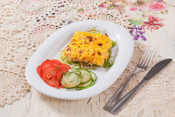 fish with cheese sauce and vegetables Serving Table