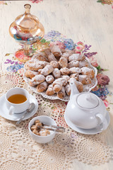 beautifully decorated table with tea and biscuits