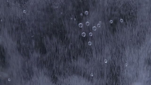 Sparkling Bubbles in glass of water 