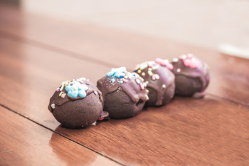 Chocolate balls topping with a sugar resin. Vintage color tone.