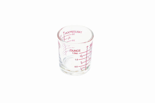 ounce (Selected focus) measuring glass (isolated and have clippi