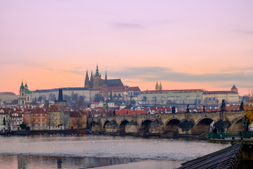 Fototapeta na wymiar Citiscape view of Prague castle and Charles bridge at sunrise