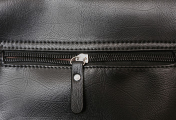 zipper on the black leather