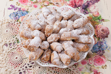 biscuits with icing sugar on a plate
