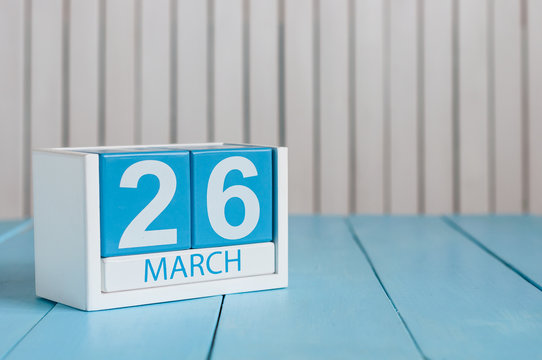 March 26th. Image of march 26 wooden color calendar on white background.  Spring day, empty space for text. Purple DAy is the international day For epilepsy awareness.
