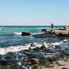 Man fishing on the sea